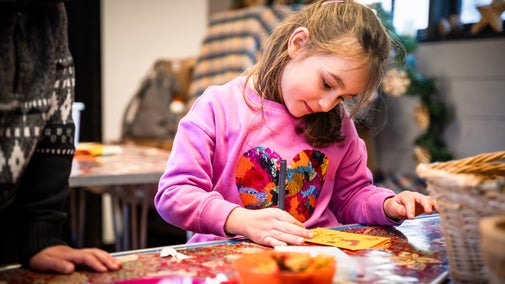 Children making Christmas cards